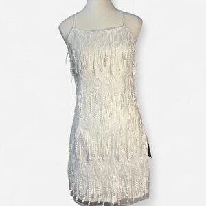 Making Magic White Fringe Lace-Up Mini Dress.‎